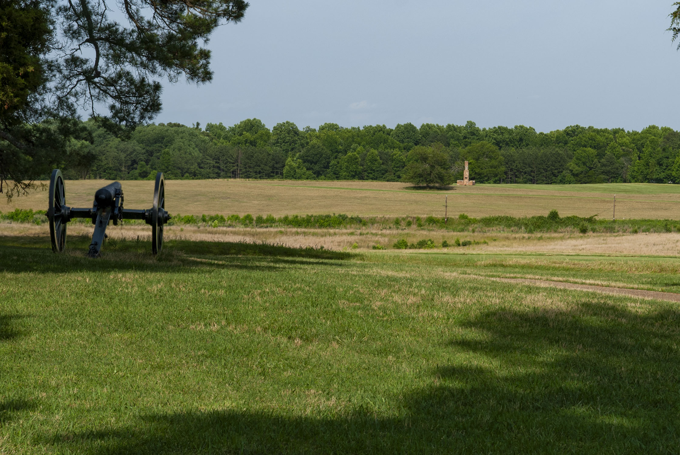 Field of War - a canon pointing towards a field