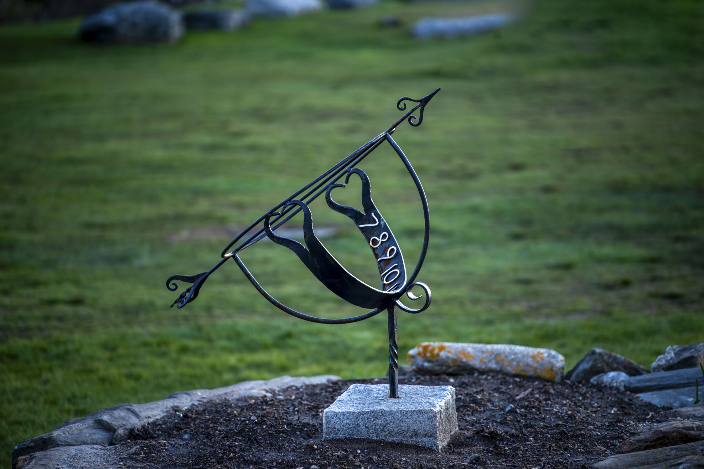 A unique curved sundial sculpture