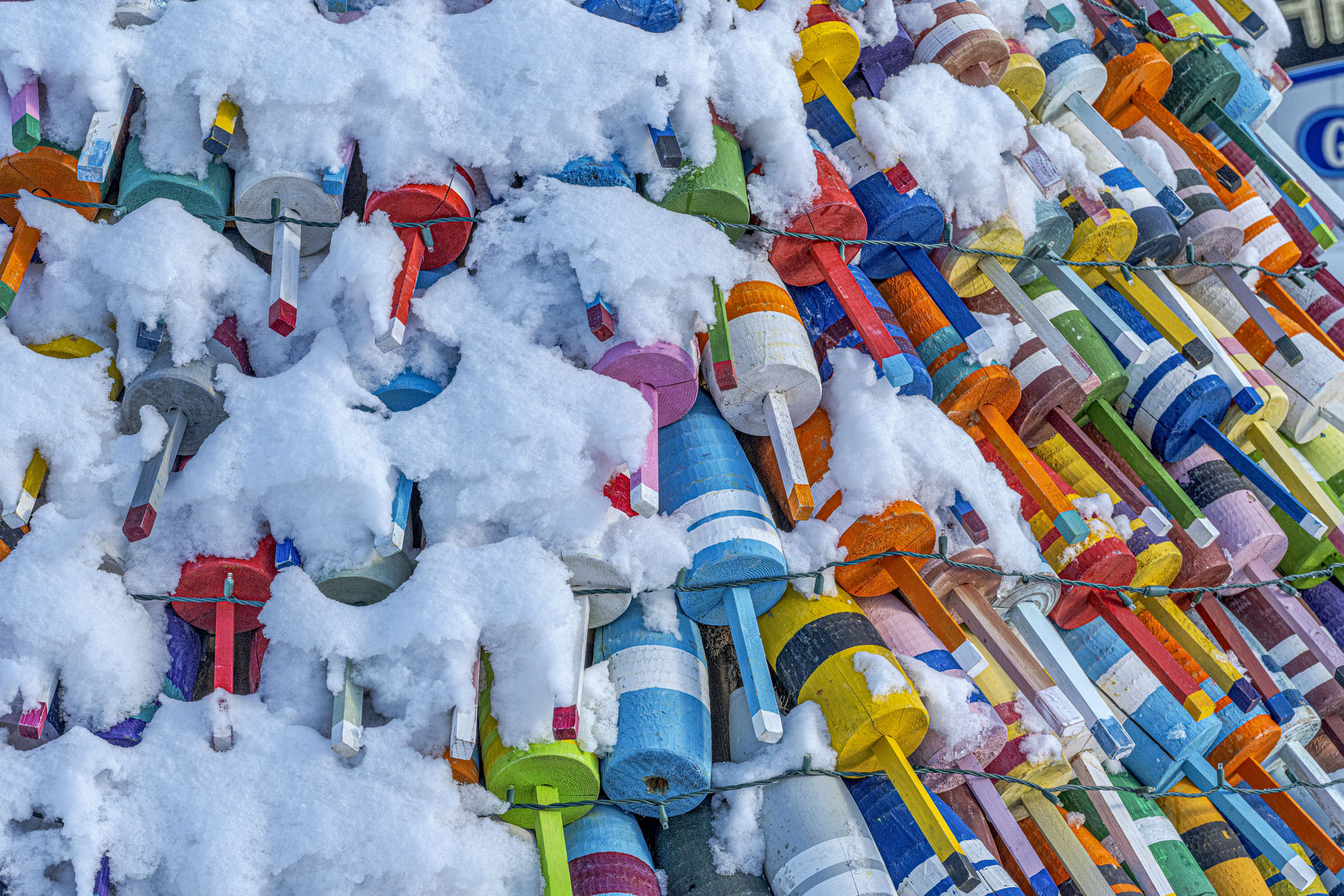 Colorful buoys and snow