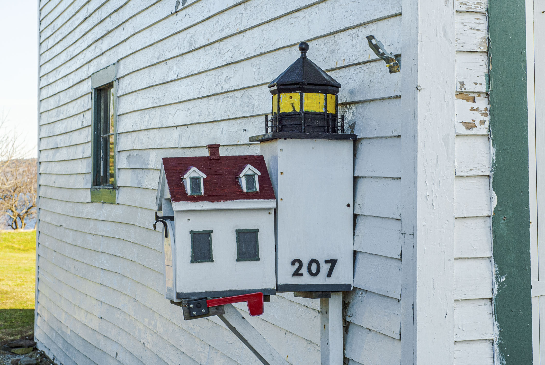 Lighthouse shaped mailbox