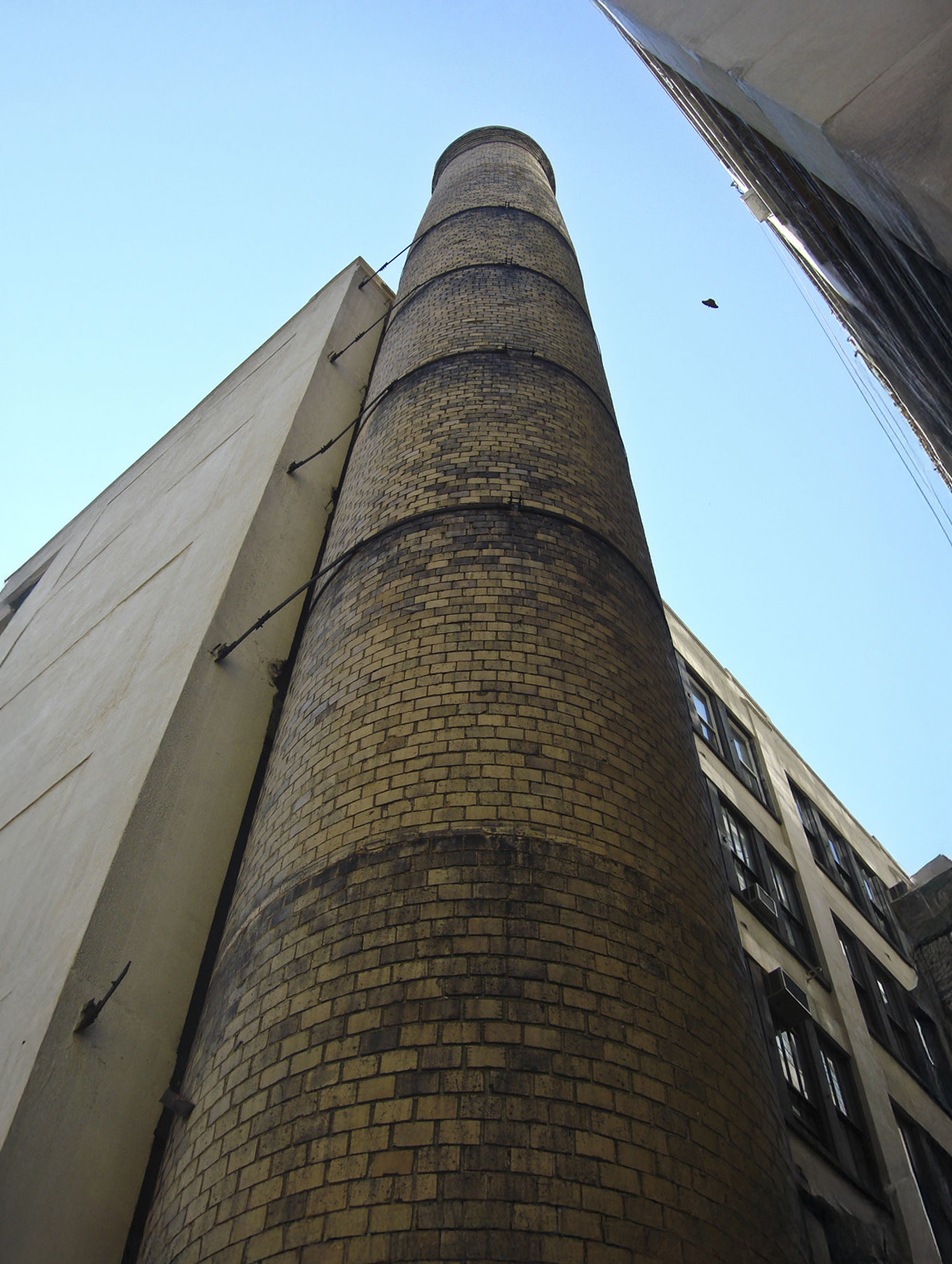 Looking up a large round chimney in New York City