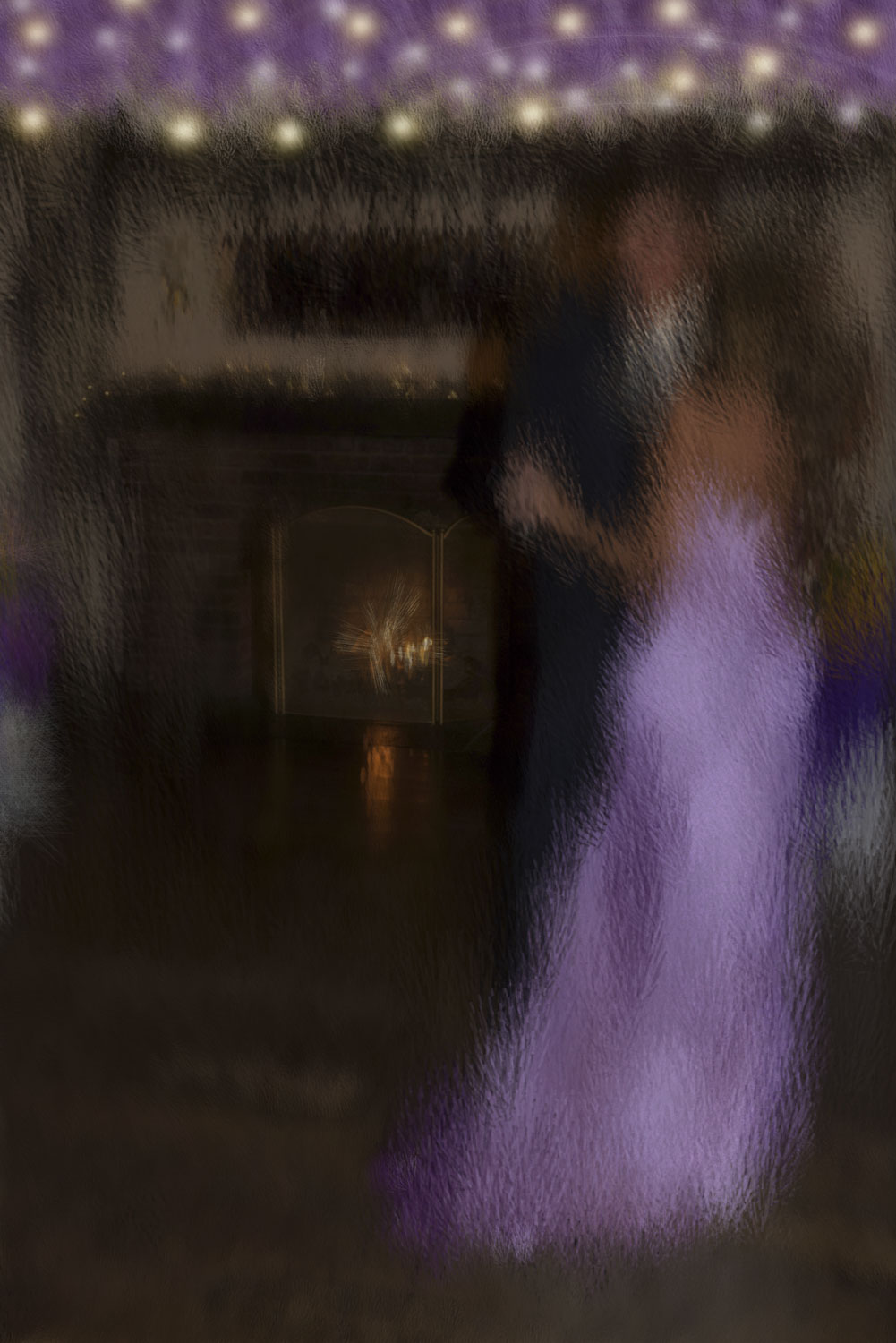 a fireplace with a fuzzy image of a couple dancing