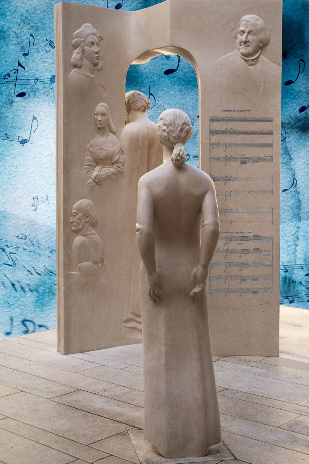 Sculpture from Pesaro Italy put against musical notes